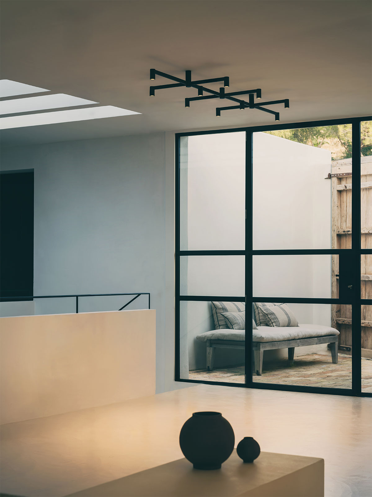 Vibia The Edit - Nexum redefines the chandelier as an architectural lighting system